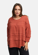 Tunica ampia con taglio a balze 'Ferina'