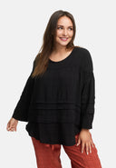 Tunica ampia con taglio a balze 'Ferina'