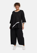 Blusa 'Saria' – assimétrica, leve e natural