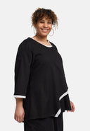 Blusa 'Saria' – assimétrica, leve e natural